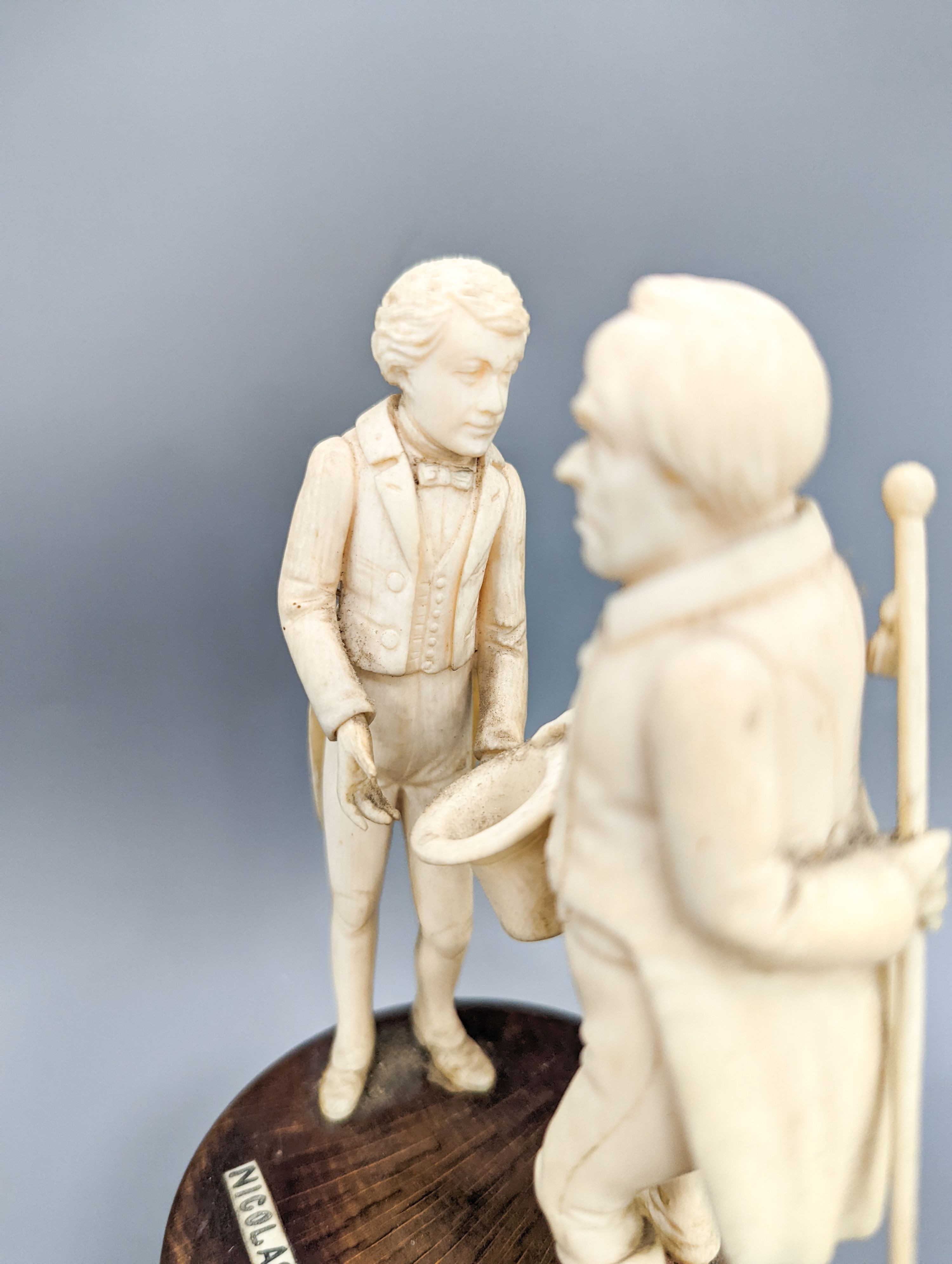 Three South German ivory Dickens characters groups or figures, early 20th century, tallest 15.5cm